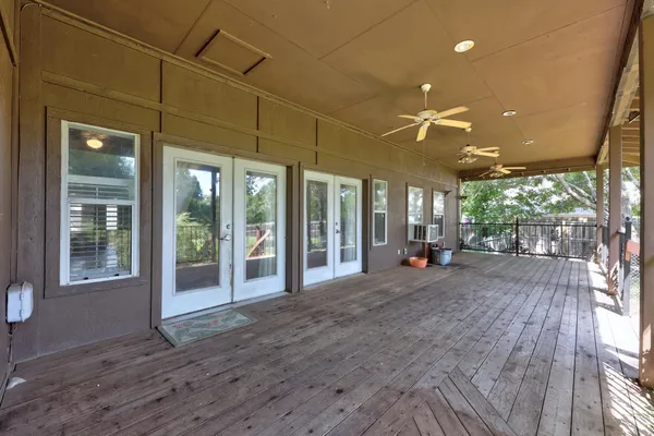 a view of a building with porch and outdoor space