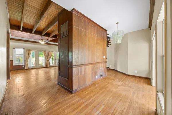 a view of gallery with wooden floor