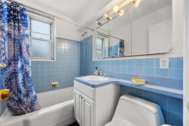a bathroom with a sink and a bathtub