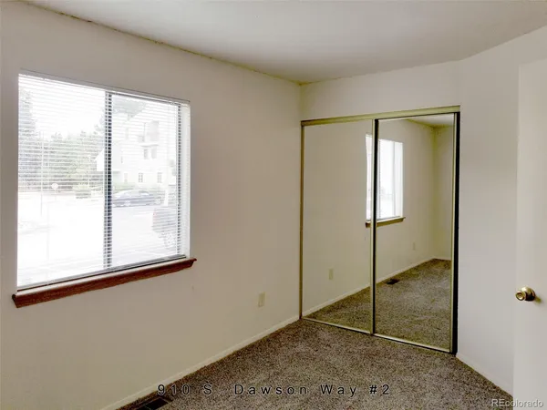 a view of an empty room with window