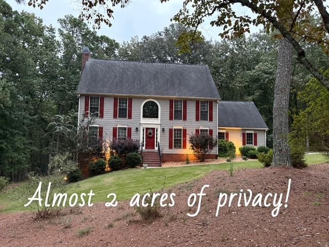 82 Cedar Bluff Winder, GA 30680 - Photo 1 of 47 front view of a house with a yard