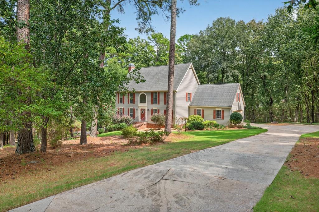82 Cedar Bluff Winder, GA 30680 - Photo 16 of 47 front view of a house with a yard
