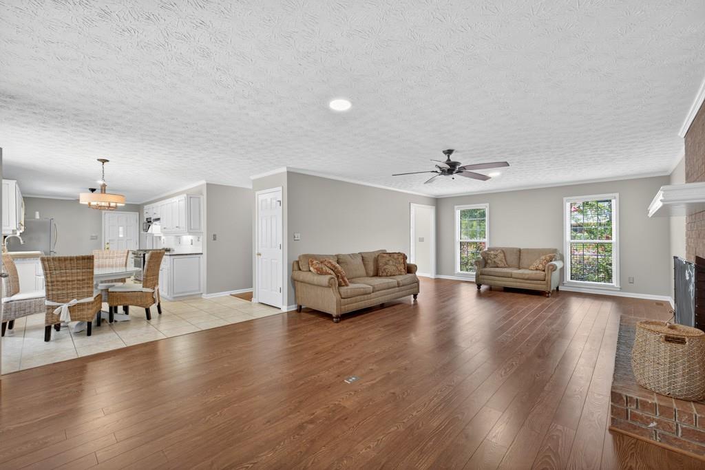 82 Cedar Bluff Winder, GA 30680 - Photo 18 of 47 a living room with furniture and a wooden floor