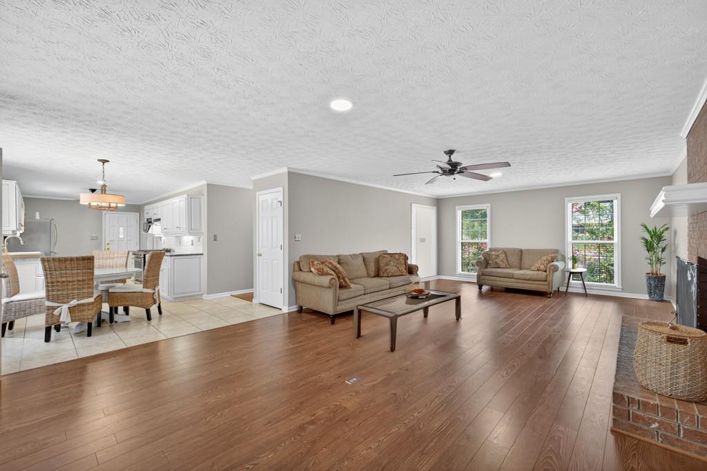 82 Cedar Bluff Winder, GA 30680 - Photo 19 of 47 a living room with furniture and a wooden floor