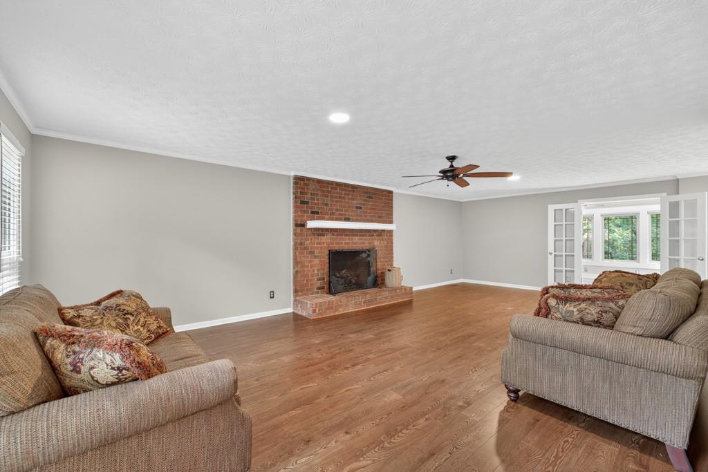 82 Cedar Bluff Winder, GA 30680 - Photo 20 of 47 a living room with furniture and a fireplace