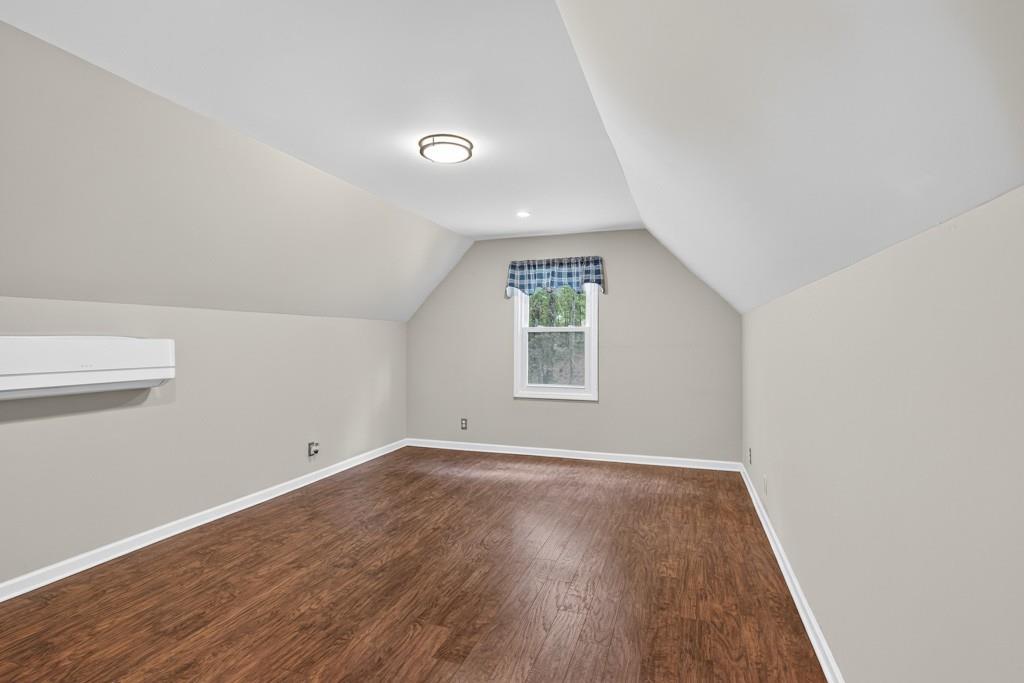 82 Cedar Bluff Winder, GA 30680 - Photo 38 of 47 an empty room with wooden floor and windows