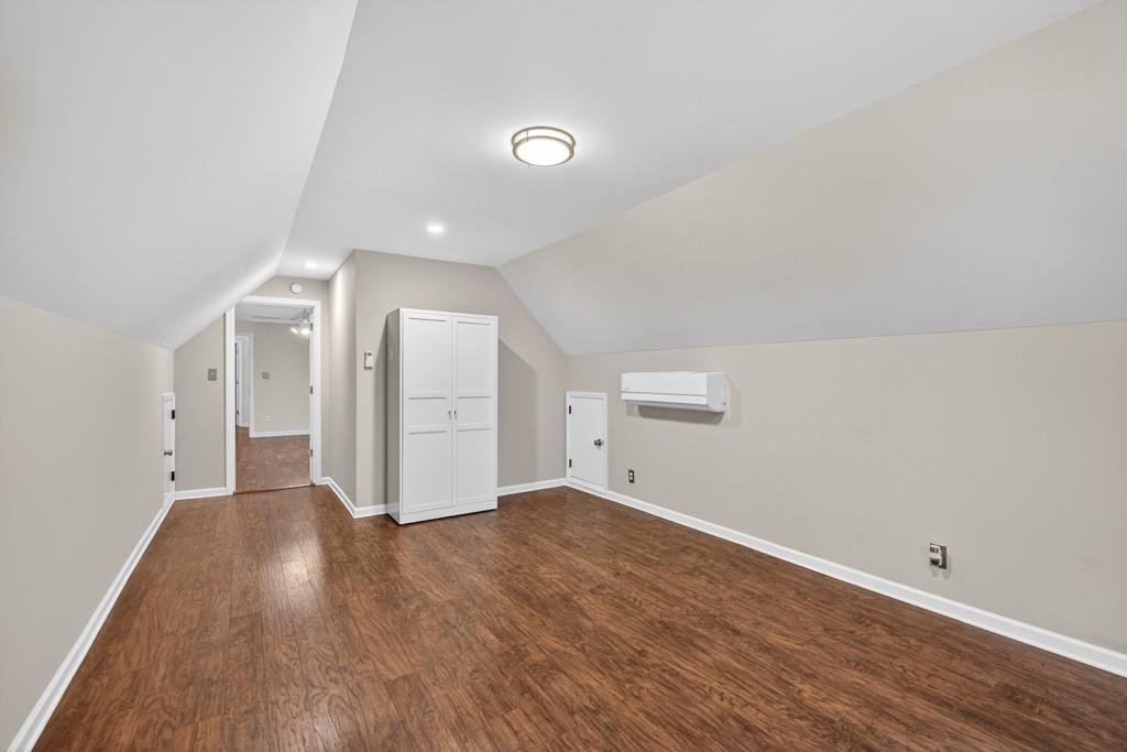 82 Cedar Bluff Winder, GA 30680 - Photo 39 of 47 an empty room with wooden floor and windows