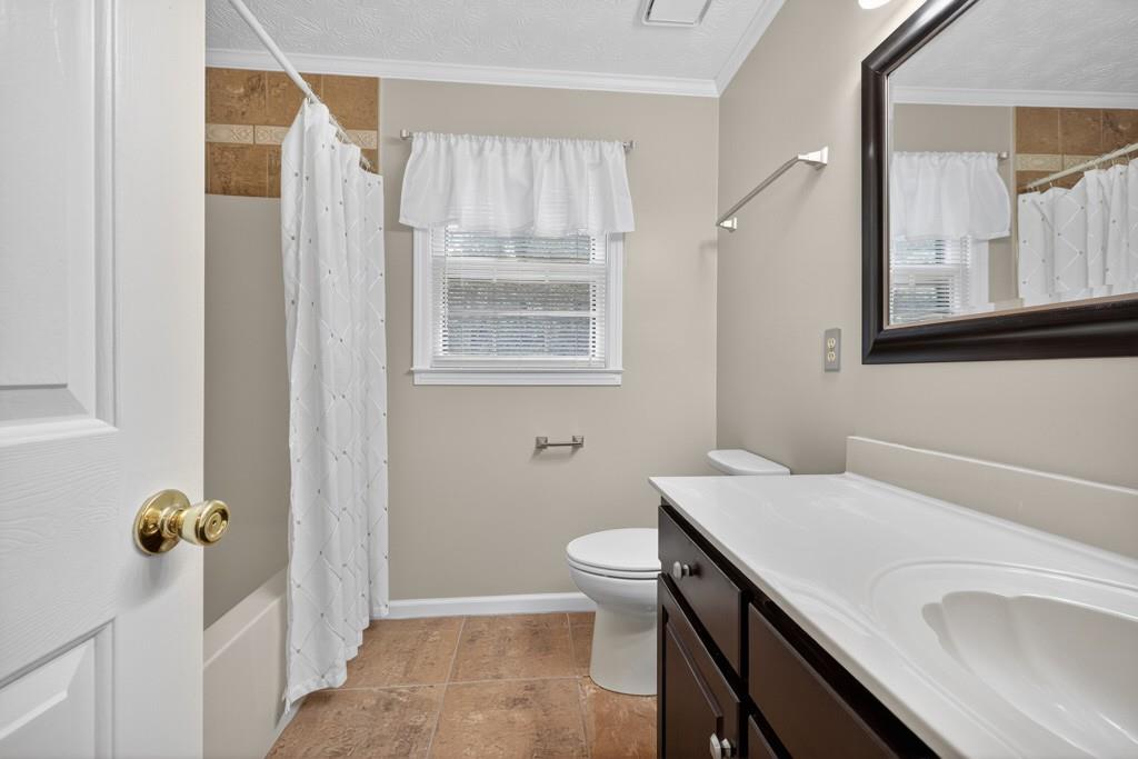 82 Cedar Bluff Winder, GA 30680 - Photo 40 of 47 a bathroom with a sink and toilet
