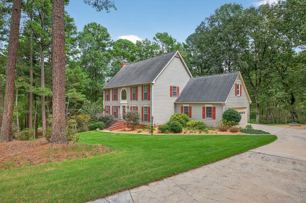 82 Cedar Bluff Winder, GA 30680 - Photo 4 of 47 front view of a house with a yard