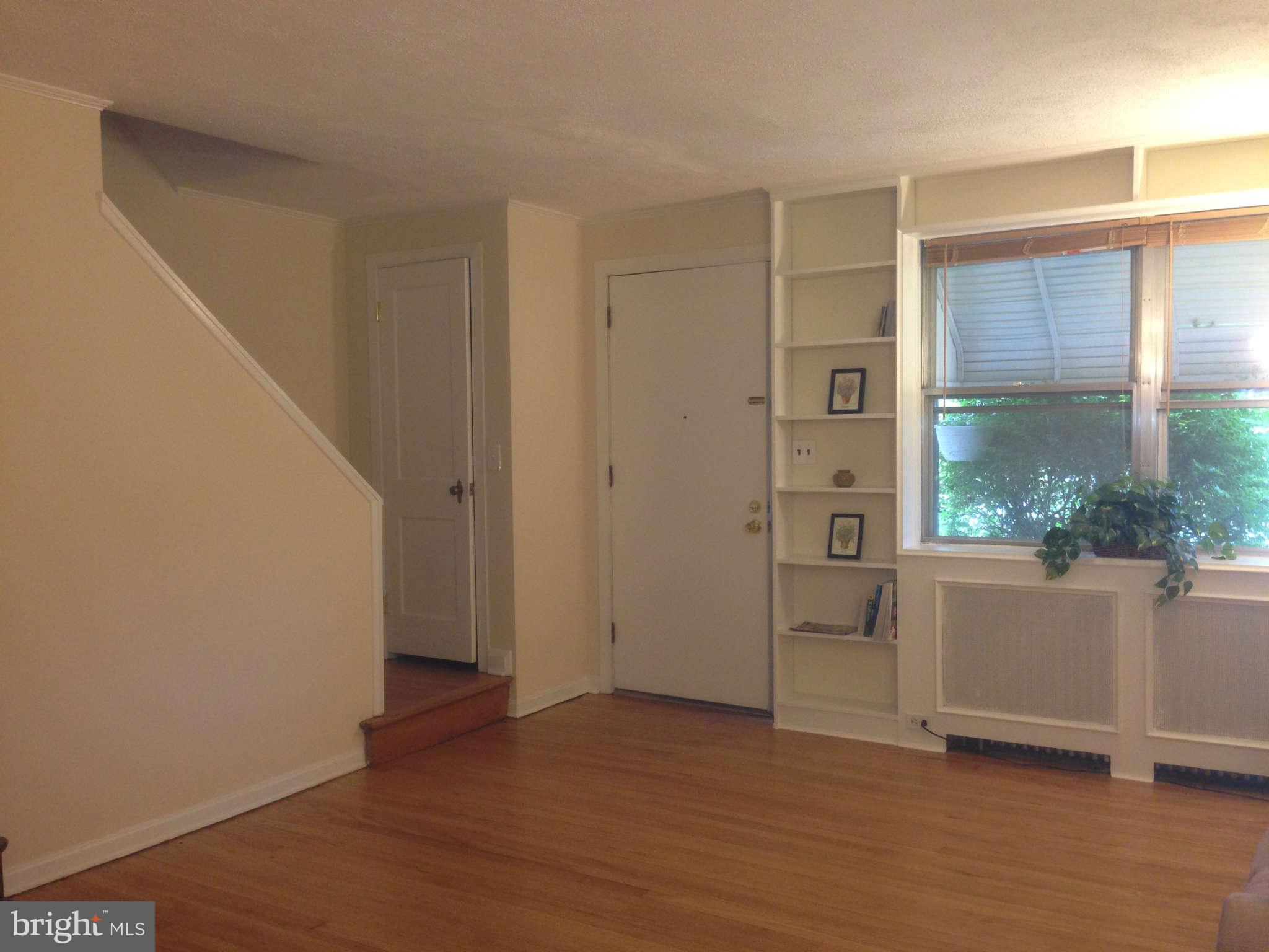 1728 Pin Oak Road Baltimore, MD 21234 - Photo 2 of 19 wooden floor in an empty room with a window