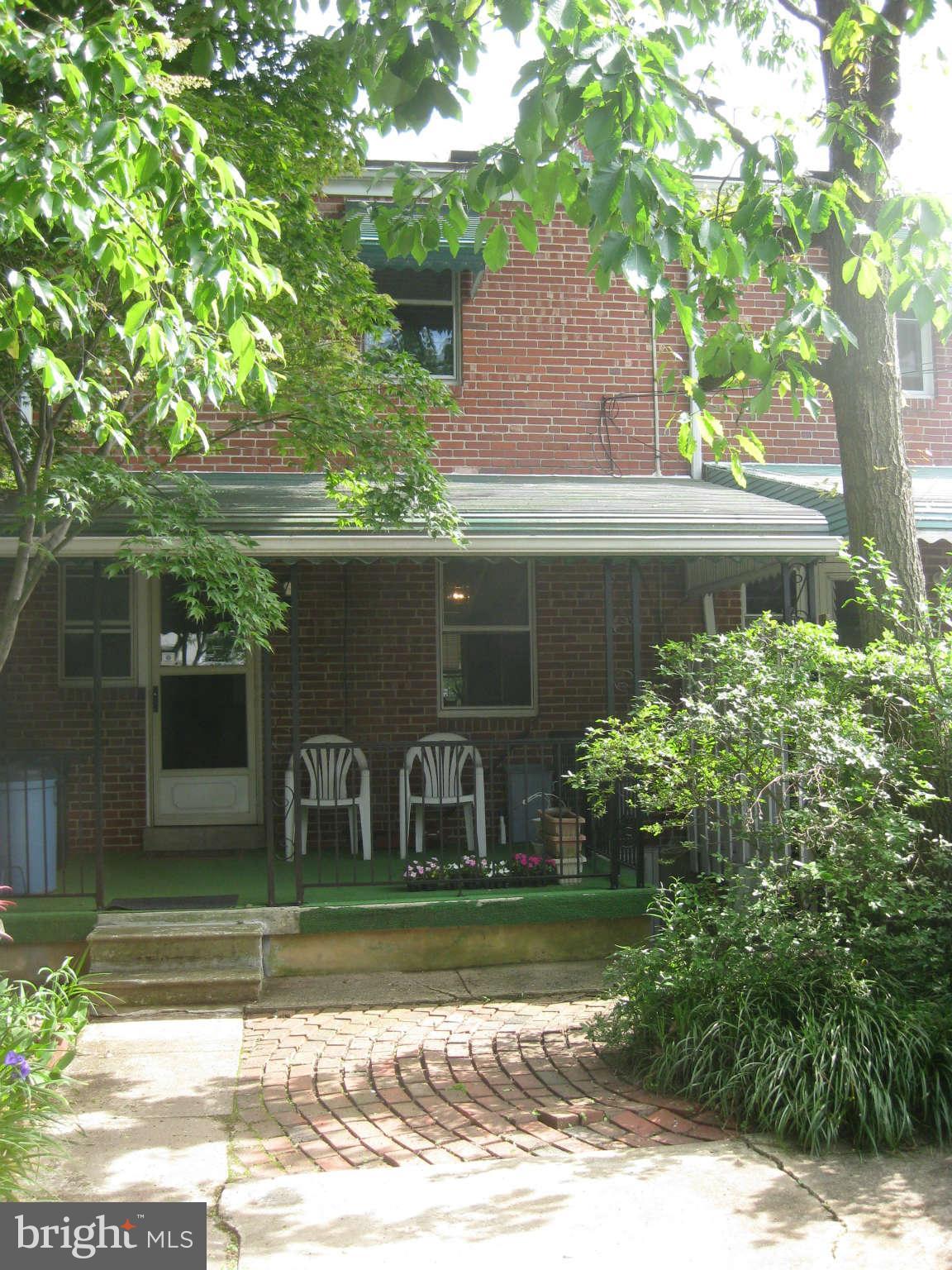 1728 Pin Oak Road Baltimore, MD 21234 - Photo 18 of 19 a front view of a house with garden