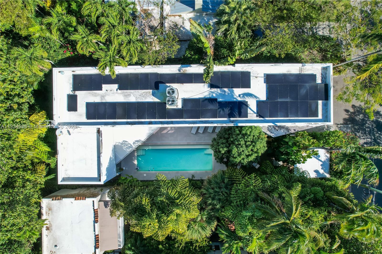 4091 Park Avenue Miami, FL 33133 - Photo 33 of 35 an aerial view of a house with yard swimming pool and outdoor seating