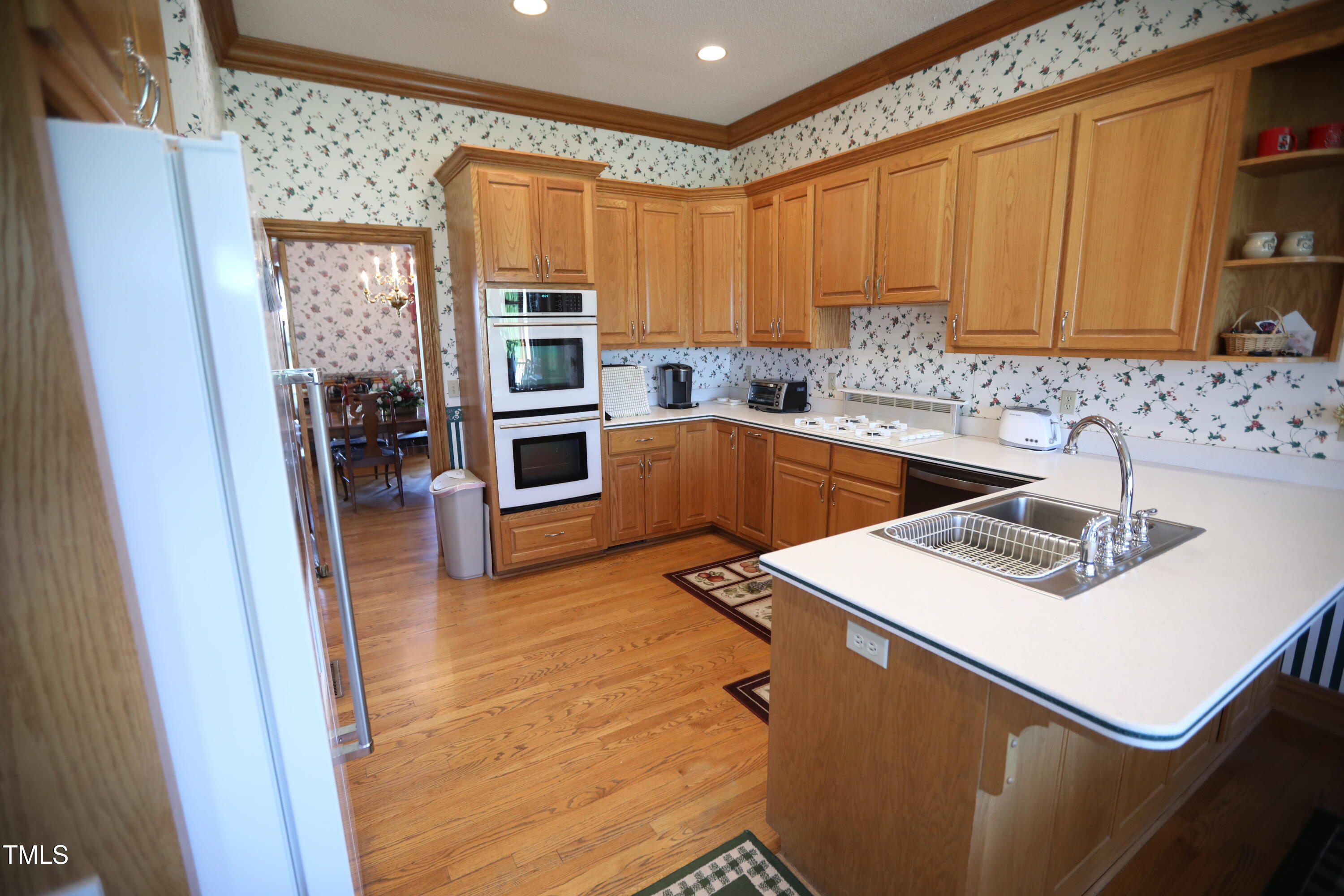 455 Hogan Farm Road Seagrove, NC 27341 - Photo 25 of 70 a kitchen with a sink appliances and cabinets