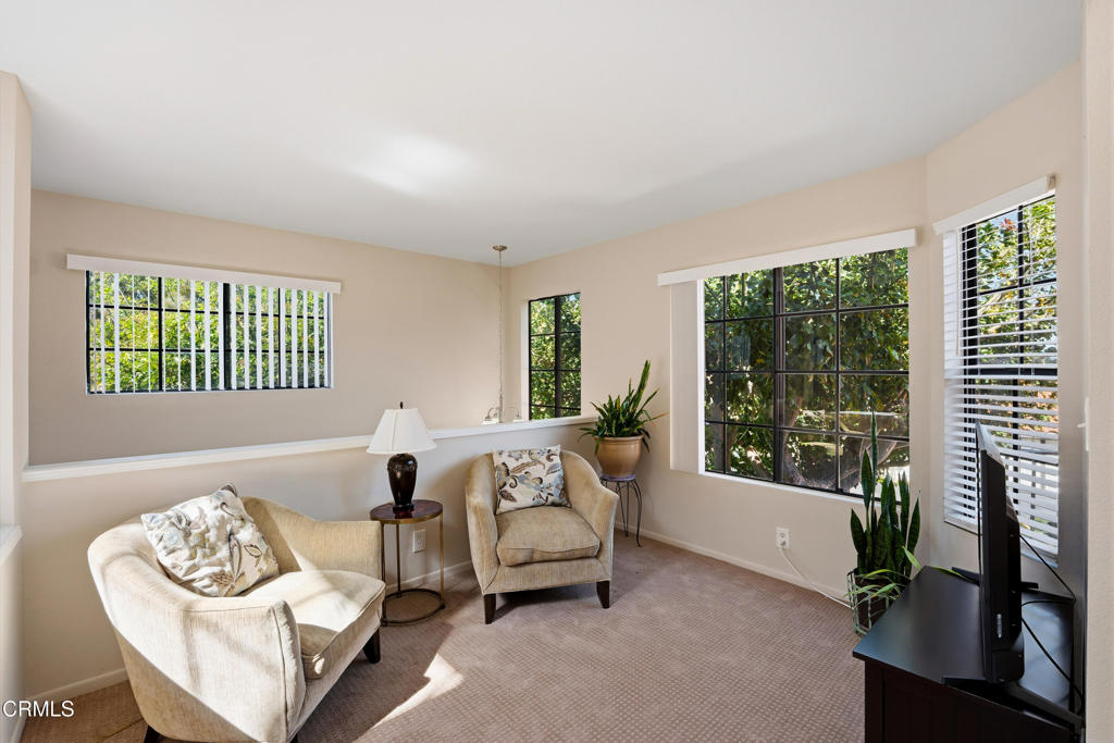 4427 Antigua Way Oxnard, CA 93035 - Photo 8 of 43 a living room with furniture and a window