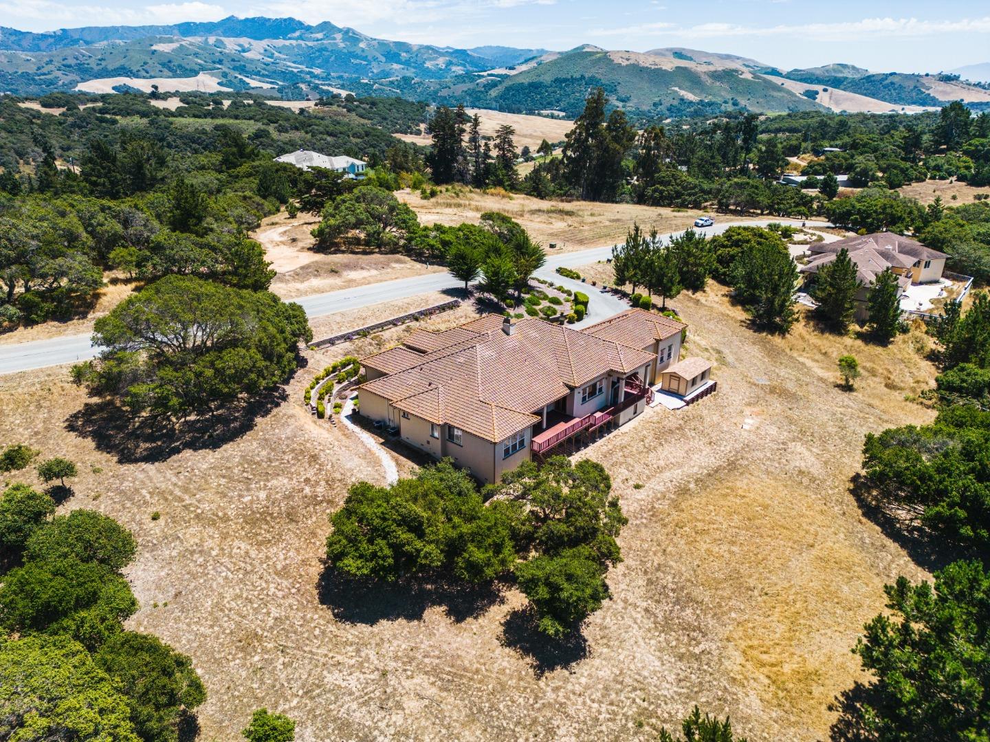 8944 Hidden Canyon Road Salinas, CA 93907 - Photo 20 of 22 an aerial view of a house with a garden