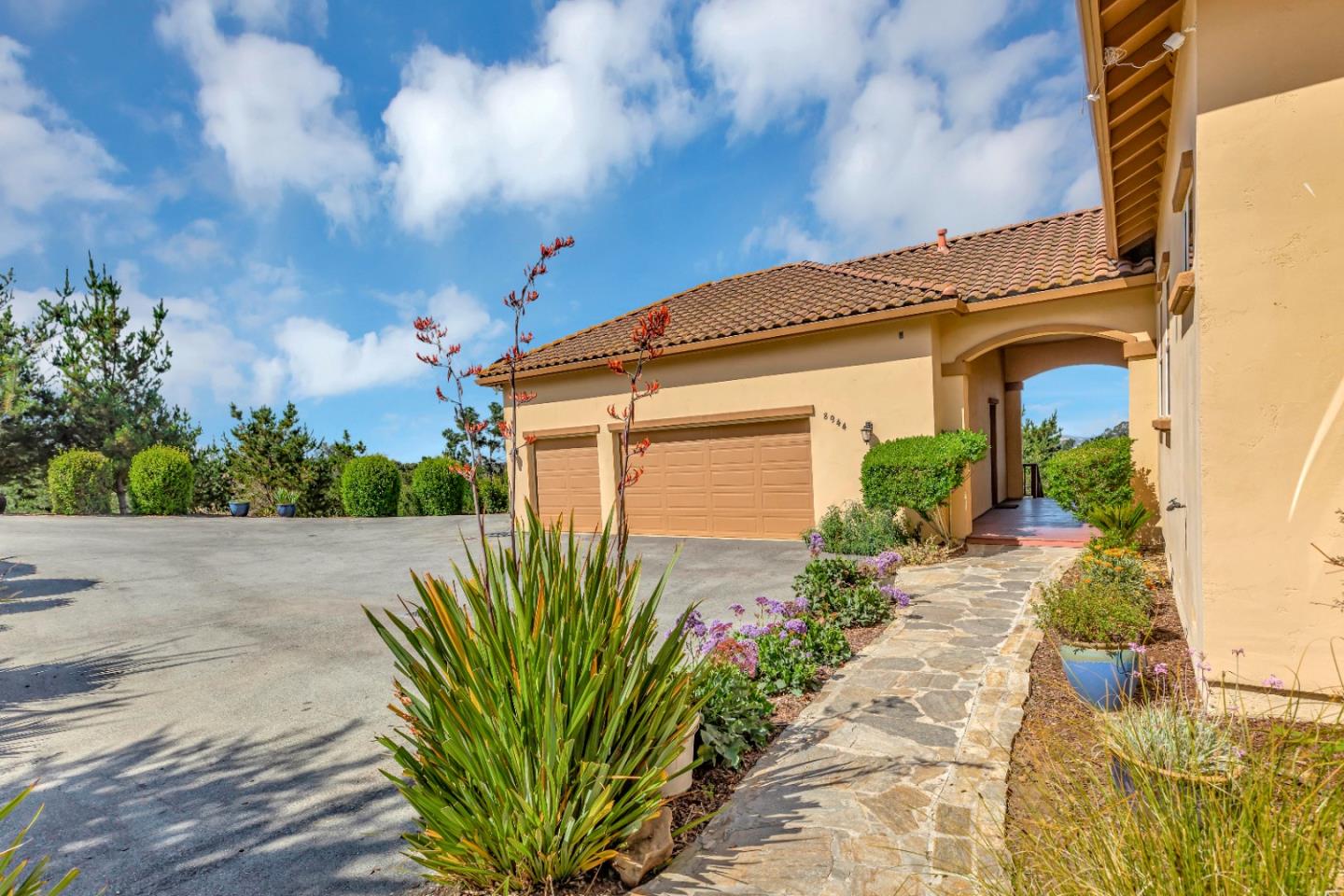 8944 Hidden Canyon Road Salinas, CA 93907 - Photo 7 of 22 a front view of a house with a big yard