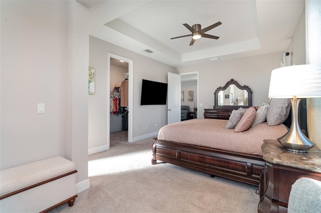 1904 146th Terrace East Parrish, FL 34219 - Photo 11 of 40 a bed room with a bed and a television