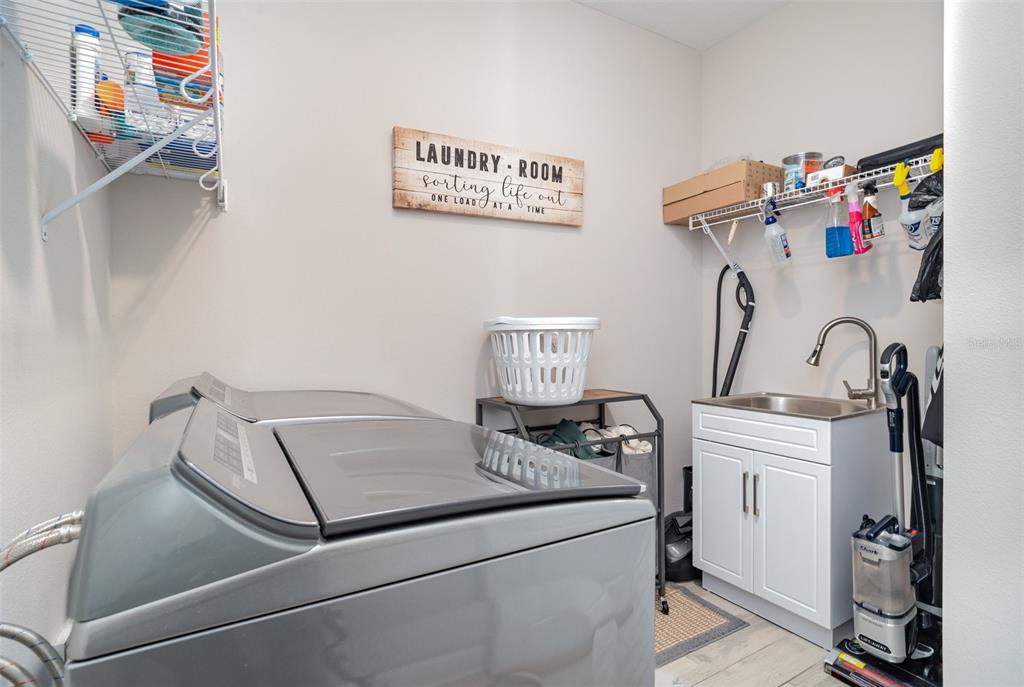 1904 146th Terrace East Parrish, FL 34219 - Photo 22 of 40 a utility room with dryer and washer