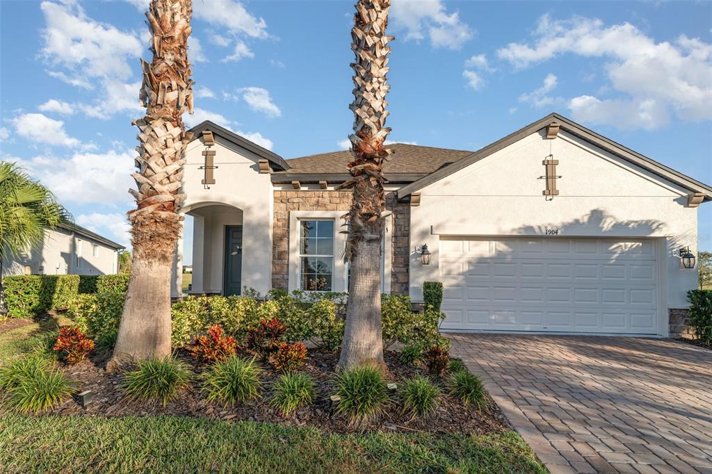 1904 146th Terrace East Parrish, FL 34219 - Photo 32 of 40 a view of a house with a yard