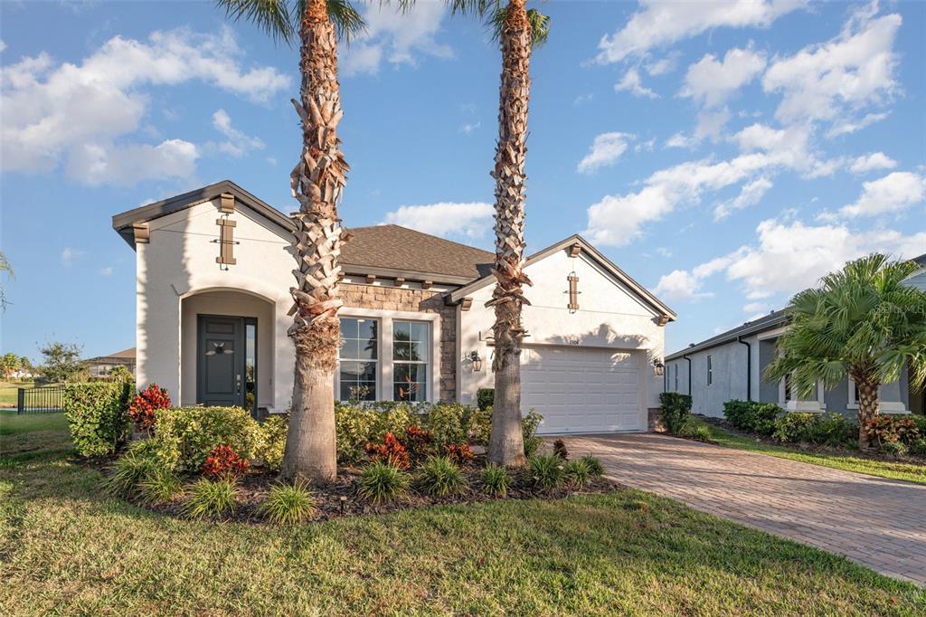1904 146th Terrace East Parrish, FL 34219 - Photo 33 of 40 a front view of a house with a yard