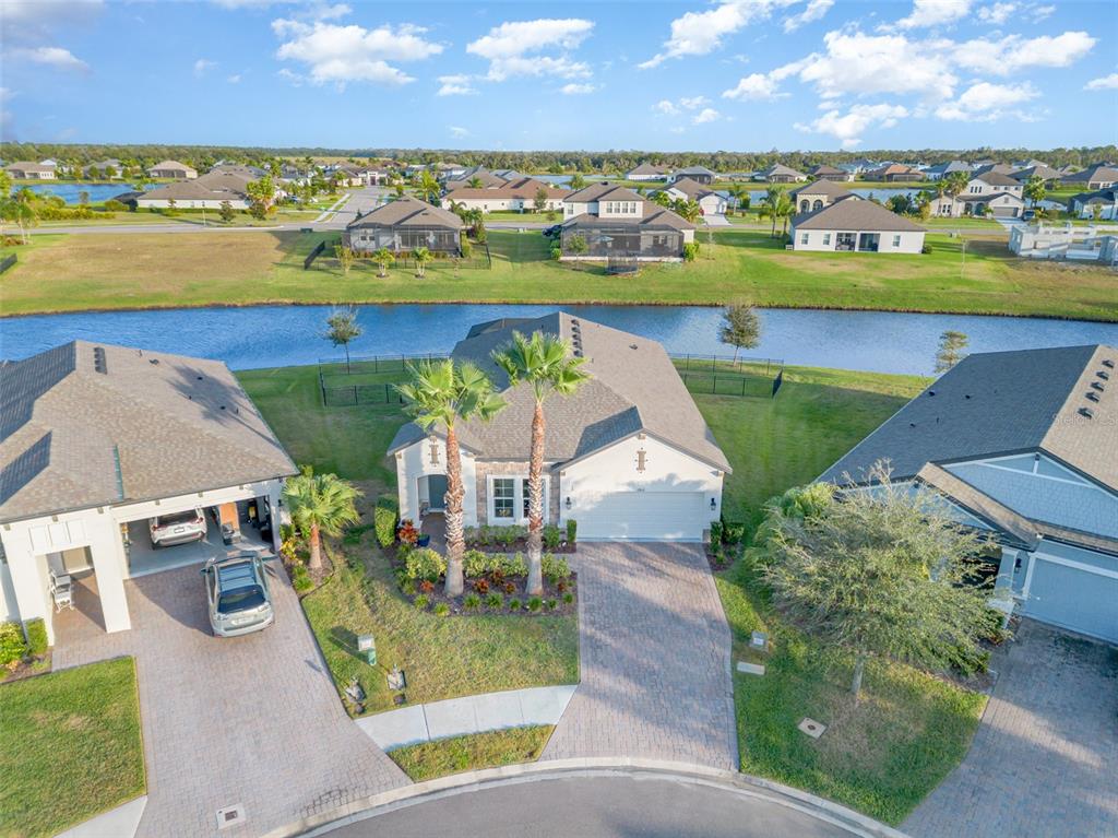 1904 146th Terrace East Parrish, FL 34219 - Photo 7 of 40 an aerial view of residential houses with outdoor space and ocean view