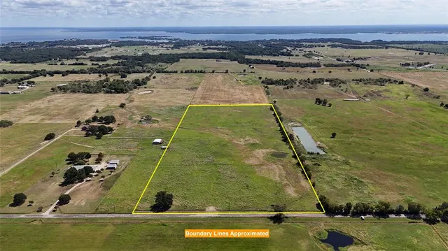 a view of a lake in a sunset