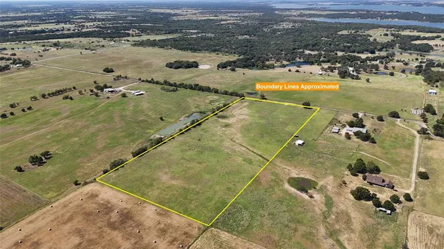 a view of a golf course with a lake