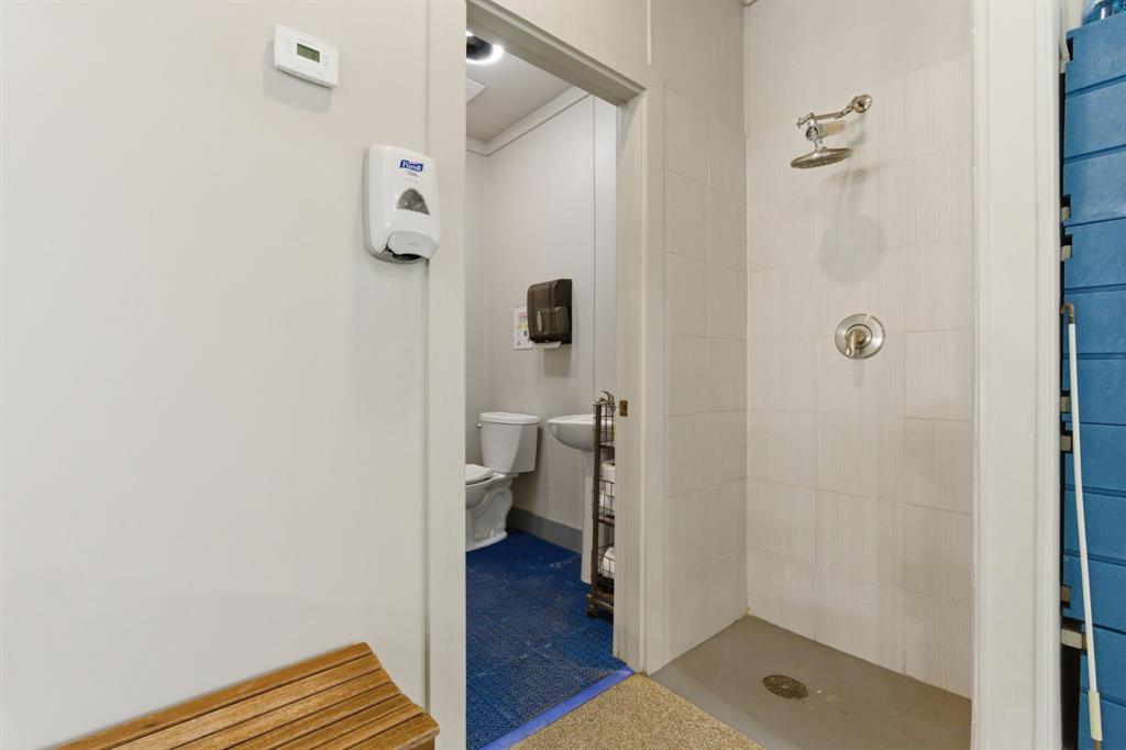10390 Ridgecrest Street Frisco, TX 75033 - Photo 36 of 40 a bathroom with a granite countertop shower