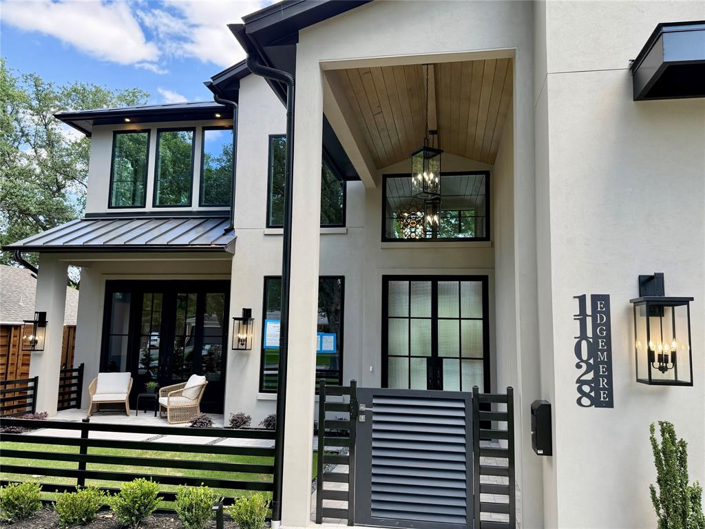 11028 Edgemere Road Dallas, TX 75230 - Photo 2 of 40 Contemporary exterior with a smooth stucco finish and prominent black-framed windows