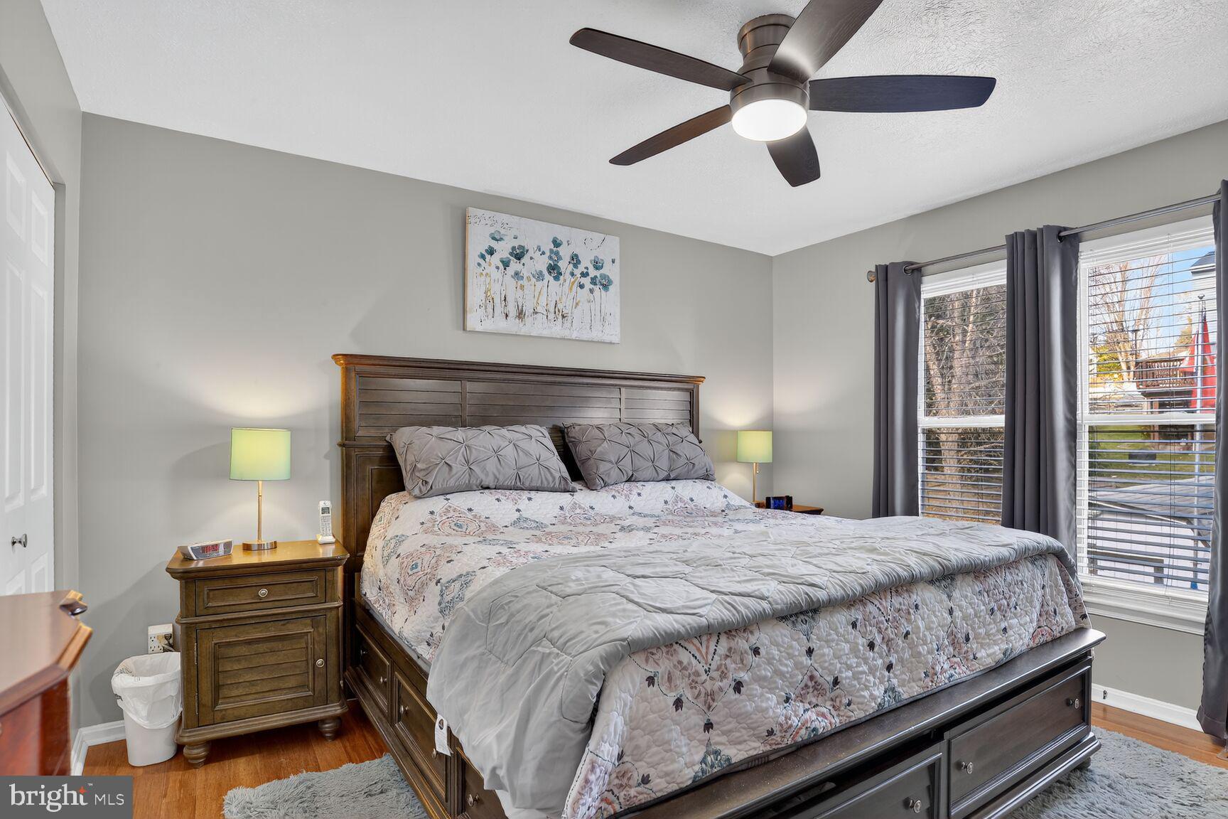 3726 Oakfalls Way Nottingham, MD 21236 - Photo 13 of 35 a bedroom with a bed and a chandelier