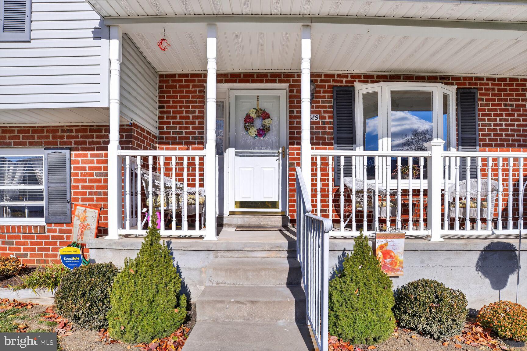 3726 Oakfalls Way Nottingham, MD 21236 - Photo 2 of 35 a front view of a house with a porch