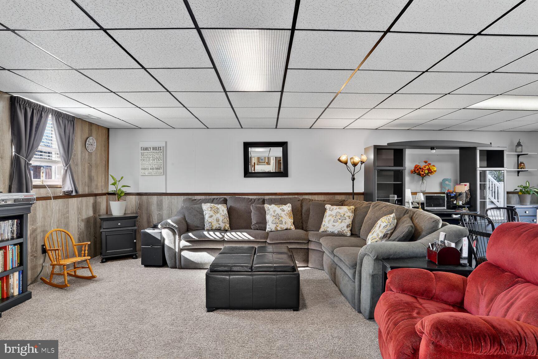 3726 Oakfalls Way Nottingham, MD 21236 - Photo 21 of 35 a living room with furniture and a gym machine