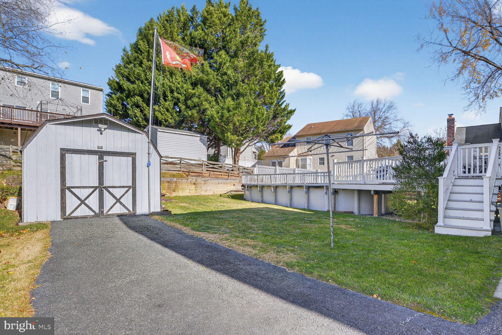 3726 Oakfalls Way Nottingham, MD 21236 - Photo 29 of 35 a view of a house with a yard and potted plants