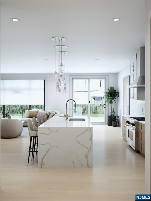 14 Feldman Court Paramus, NJ 07652 - Photo 1 of 24 a large white kitchen with a large window