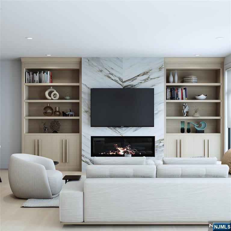 14 Feldman Court Paramus, NJ 07652 - Photo 2 of 24 a living room with furniture and a fireplace