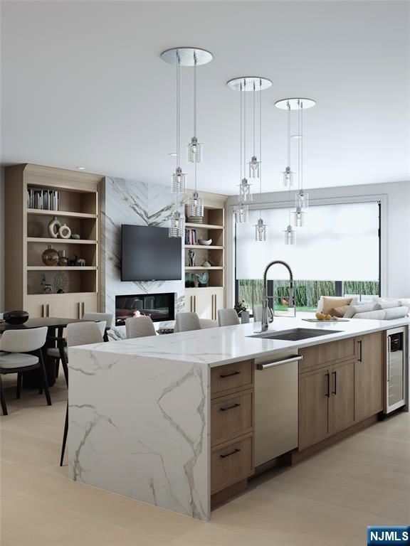 14 Feldman Court Paramus, NJ 07652 - Photo 3 of 24 a kitchen with stainless steel appliances a sink and cabinets