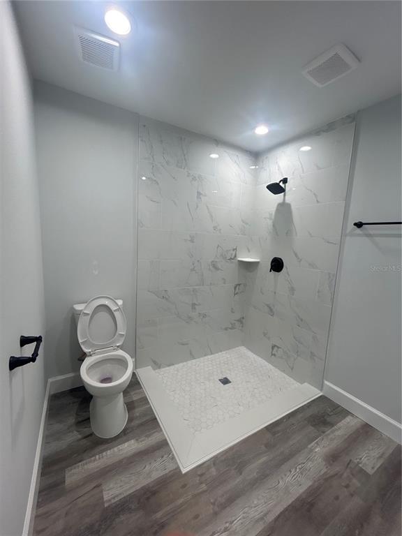 6688 Cherry Road Ocala, FL 34472 - Photo 6 of 9 a bathroom with a sink and a shower