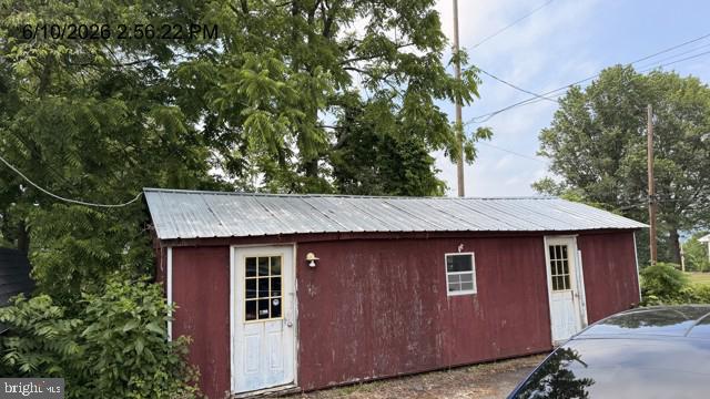 2060 Adams Road East Greenville, PA 18041 - Photo 6 of 32 Charming rustic shed amidst greenery.