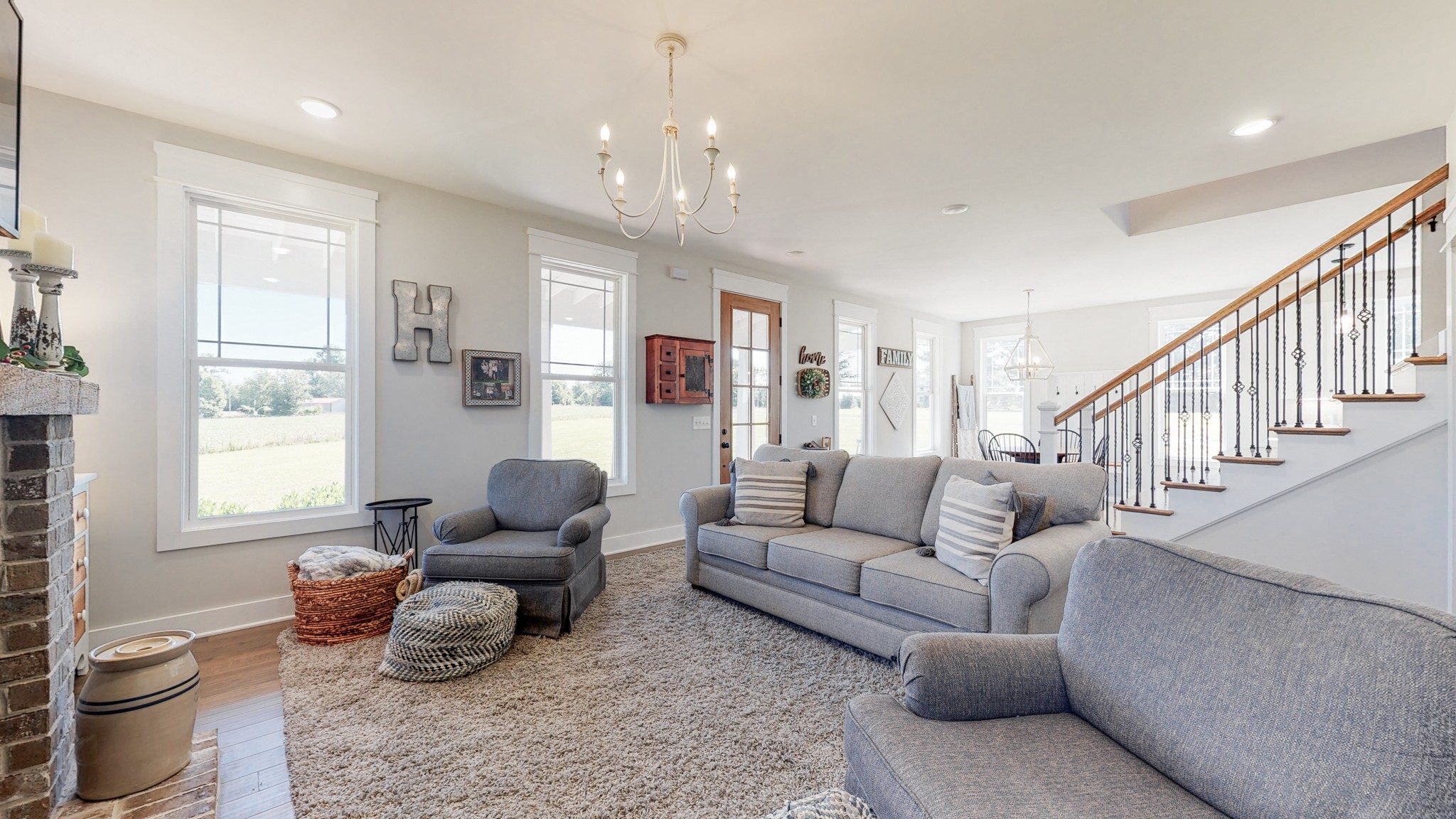 489 S Road Cottontown, TN 37048 - Photo 21 of 46 a living room with furniture fireplace and a window