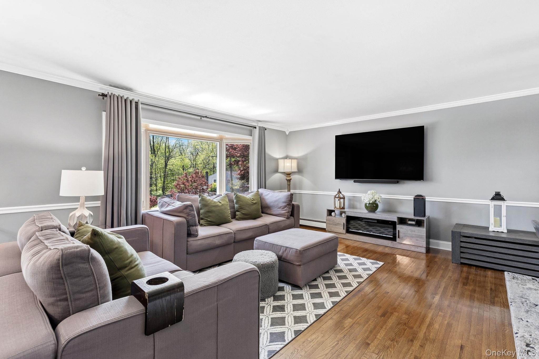 56 Tanager Road Mahopac, NY 10541 - Photo 3 of 30 a living room with furniture and a flat screen tv