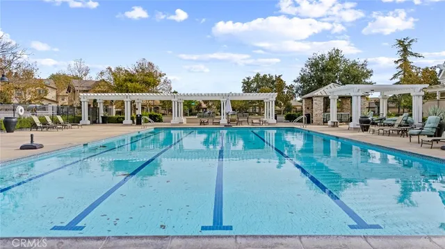 a front view of house with yard outdoor seating and hardwood floor