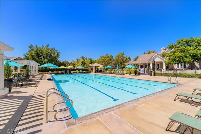 a view of a park with swings and slides