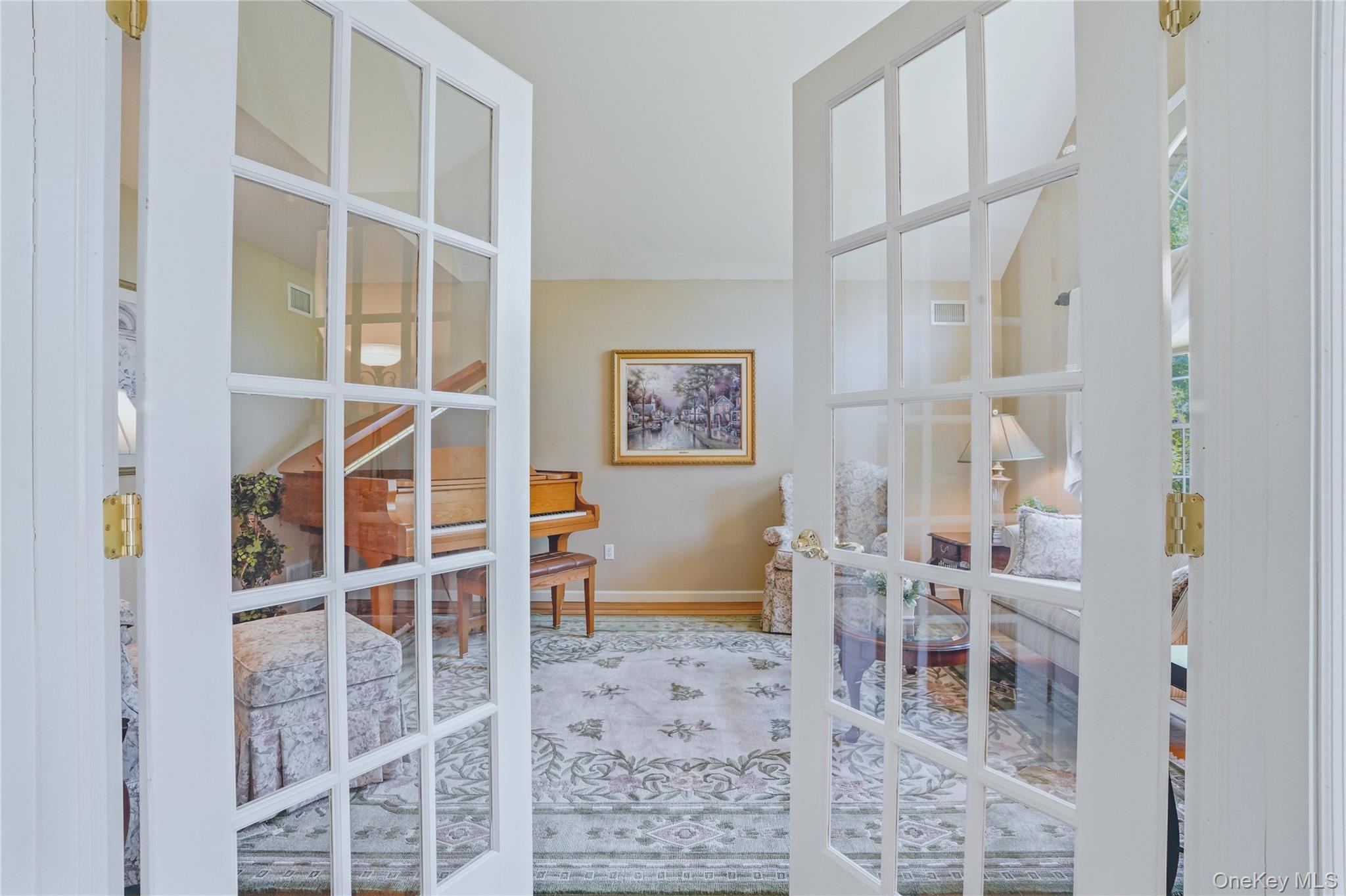 2 Windsor Lane Cornwall, NY 12518 - Photo 11 of 50 Formal living room with loft ceiling and french doors.