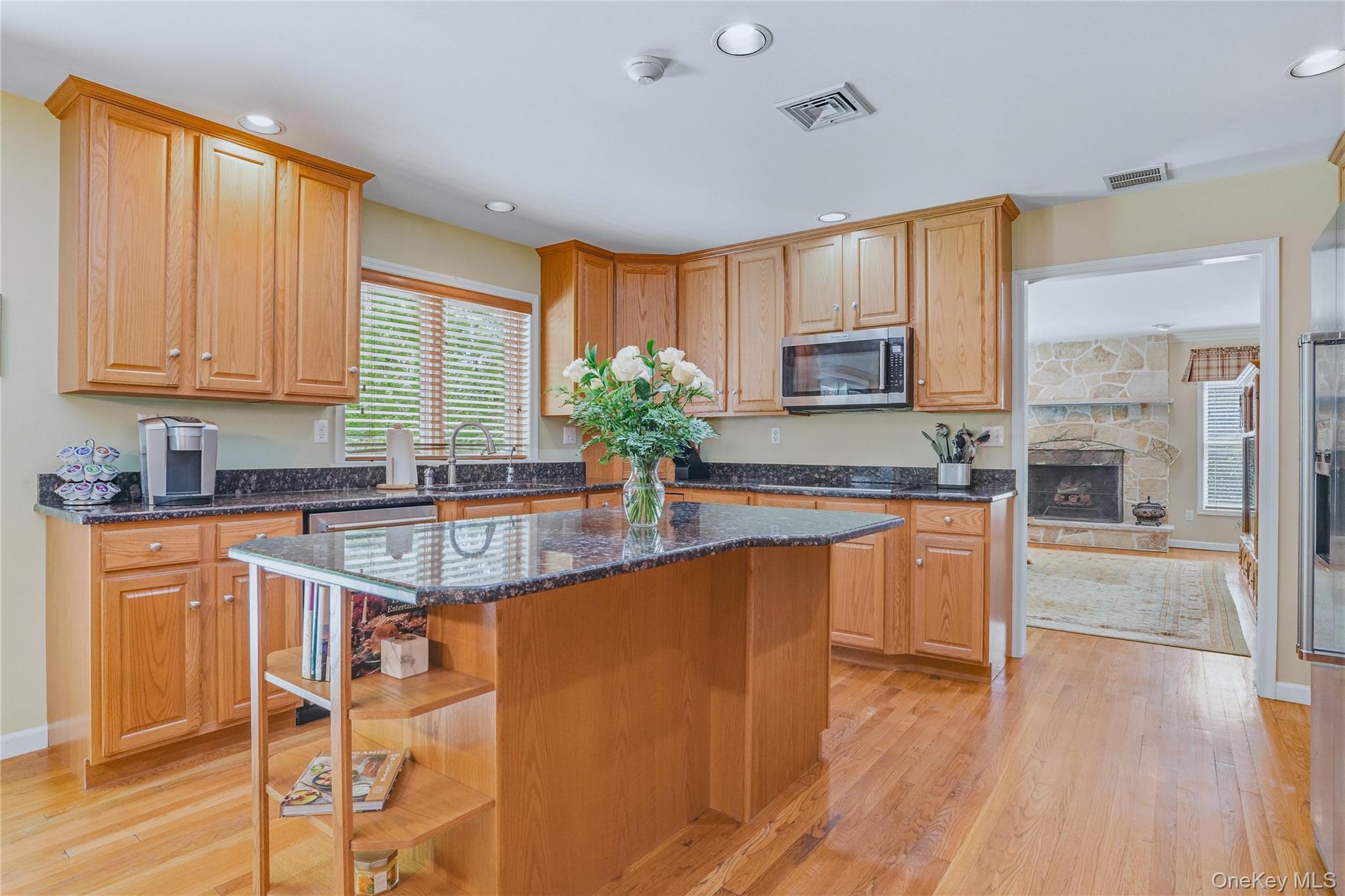 2 Windsor Lane Cornwall, NY 12518 - Photo 14 of 50 a kitchen with stainless steel appliances granite countertop a stove a sink dishwasher and a refrigerator with wooden floor