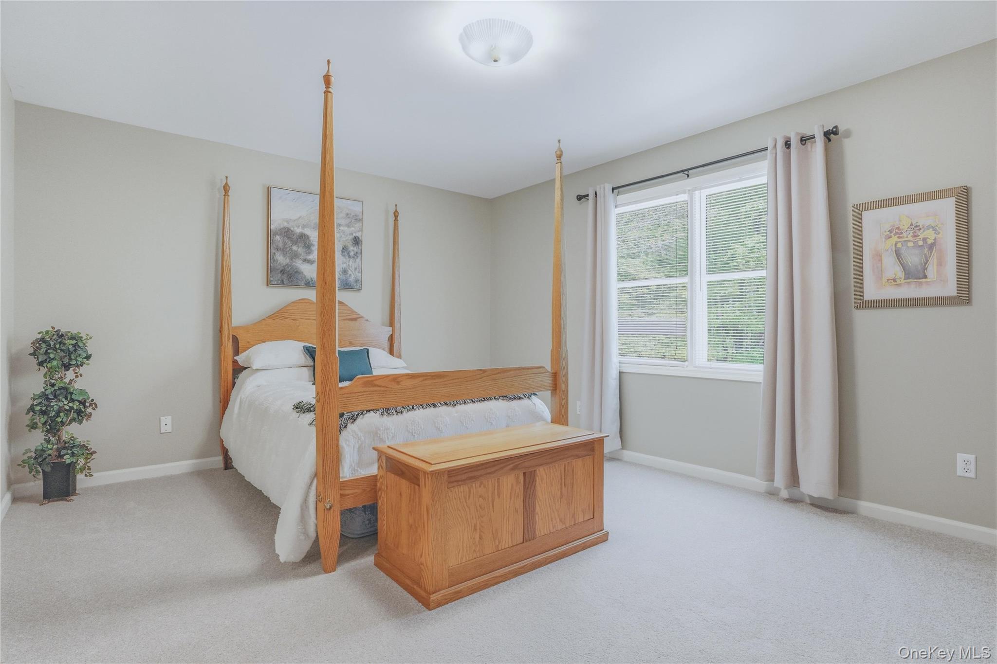 2 Windsor Lane Cornwall, NY 12518 - Photo 32 of 50 a bed sitting in a spacious bedroom next to a window