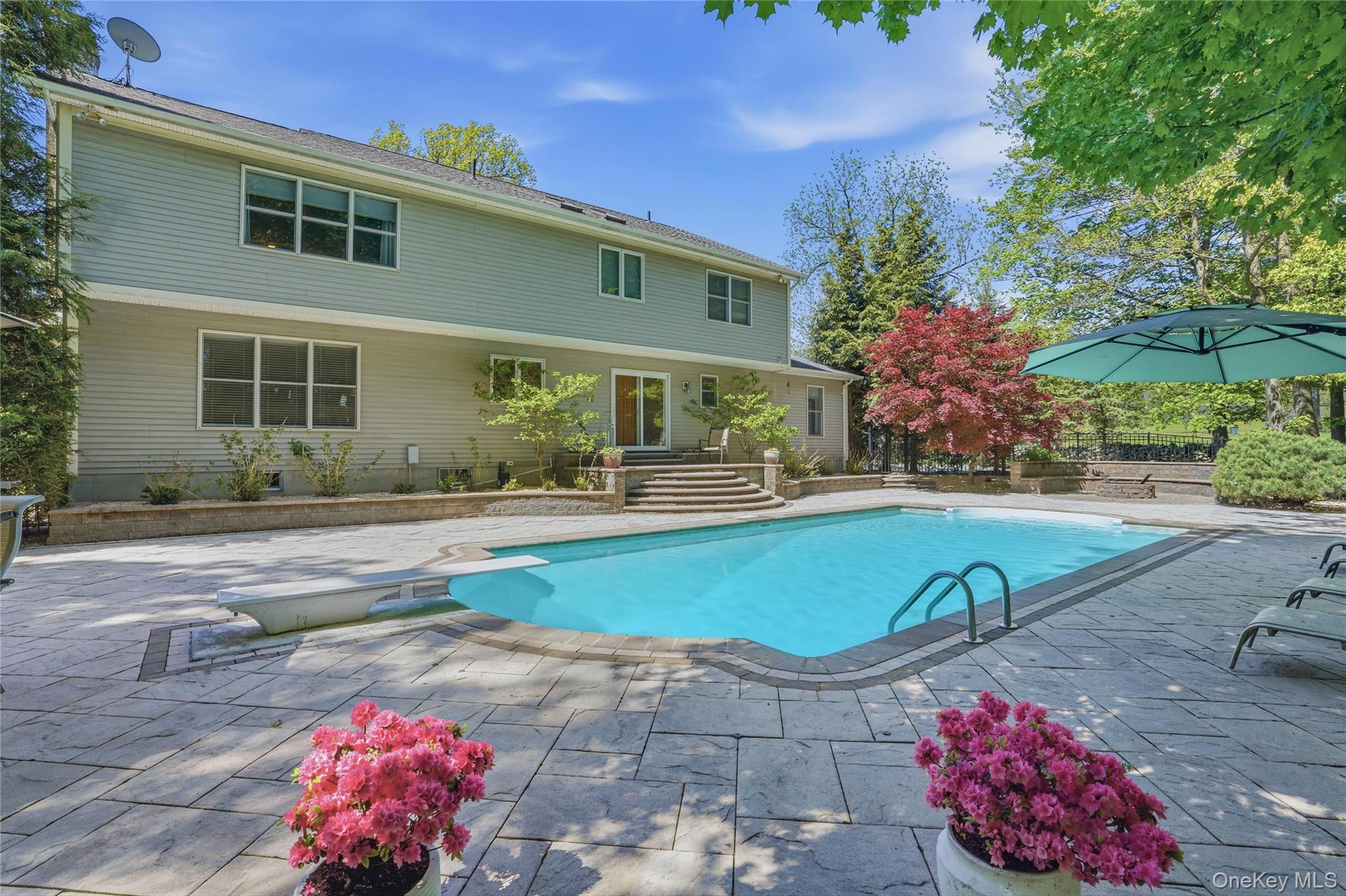 2 Windsor Lane Cornwall, NY 12518 - Photo 35 of 50 a view of a house with backyard and sitting area