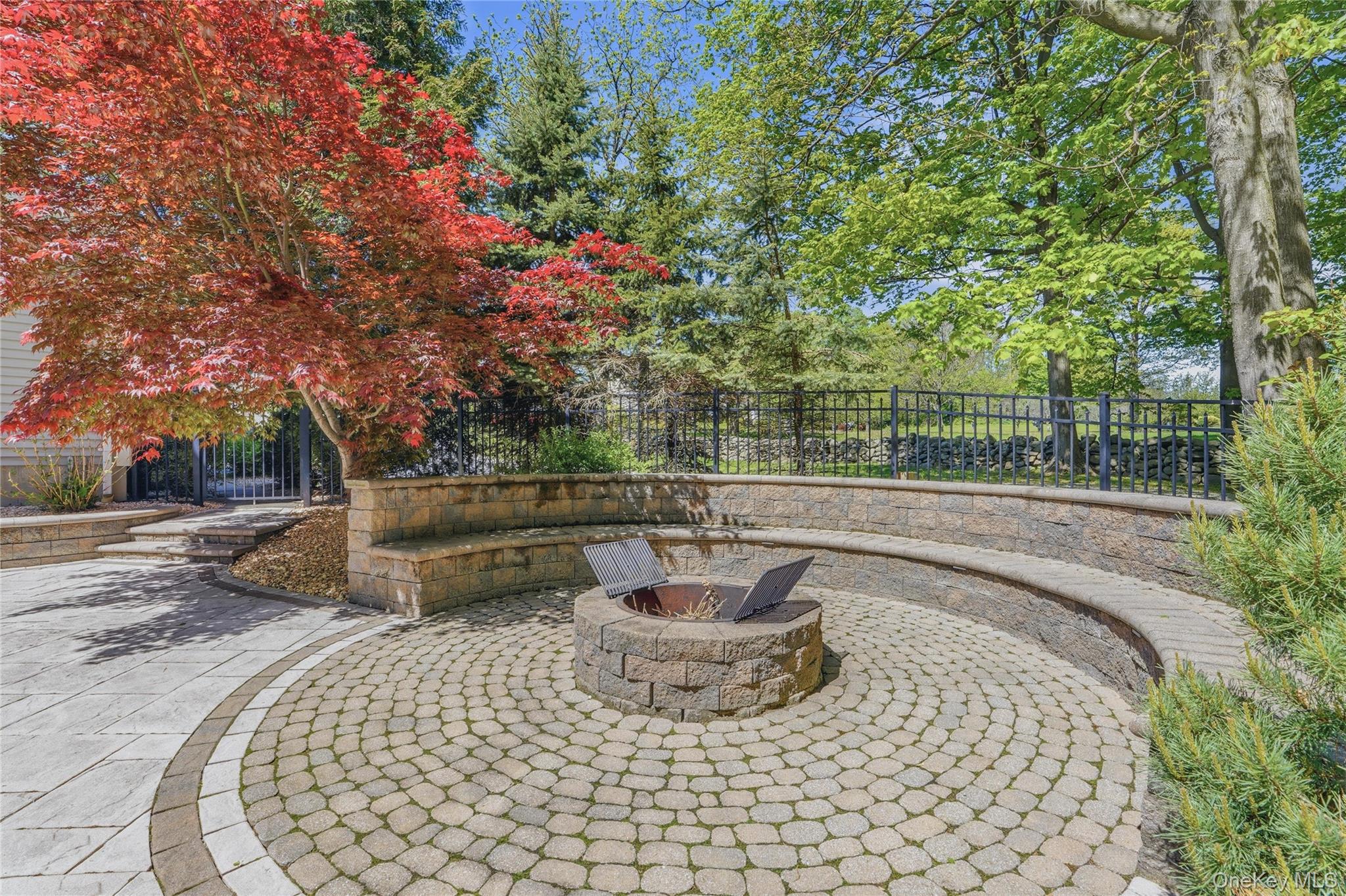 2 Windsor Lane Cornwall, NY 12518 - Photo 40 of 50 Outdoor built in fire Pit with custom paving stones and built in seating for year round enjoyment.