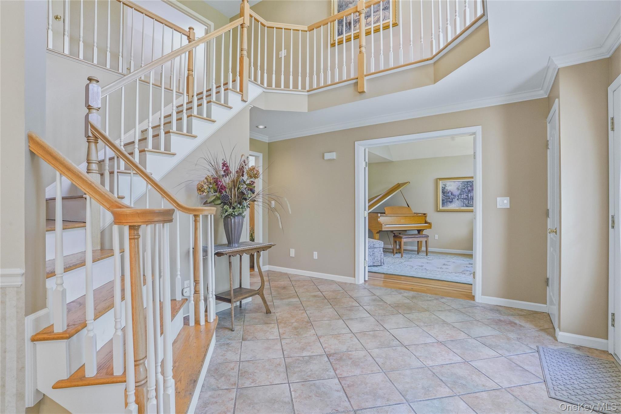 2 Windsor Lane Cornwall, NY 12518 - Photo 10 of 50 Grand foyer with tile flooring leading into formal living room.