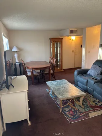 a living room with a couch and a table