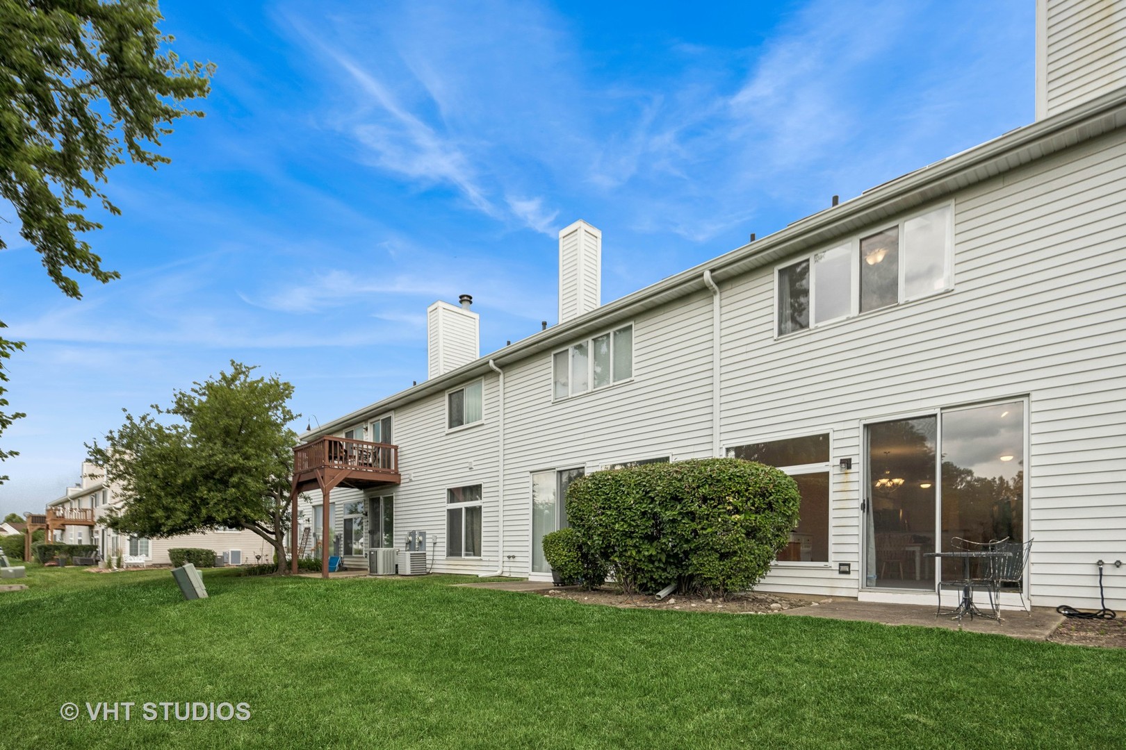 8291 Ripple Ridge, Unit 8291 Darien, IL 60561 - Photo 2 of 23 a view of a house with a yard porch and sitting area